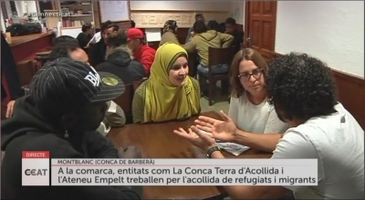 Grup de conversa amb persones migrants